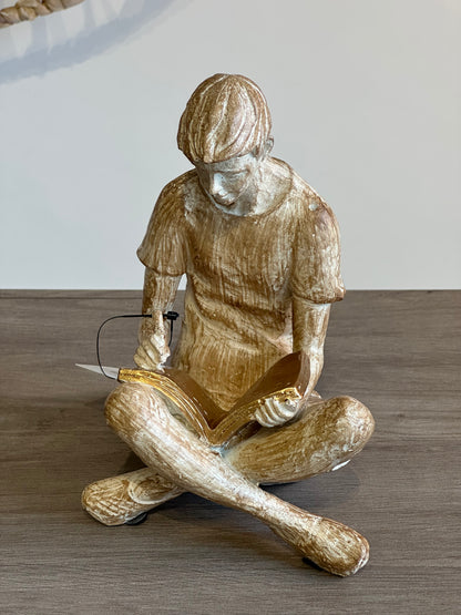 Escultura com Livro